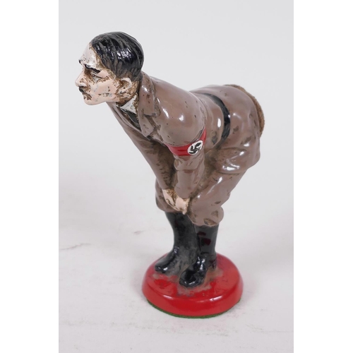 52 - A humourous and derogatory cold painted figure of Adolf Hitler, 4½