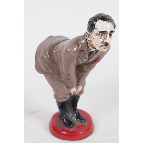 52 - A humourous and derogatory cold painted figure of Adolf Hitler, 4½