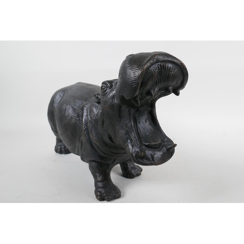 102 - A bronzed metal figure of a hippopotamus, 14