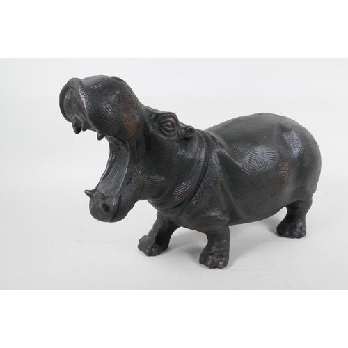 102 - A bronzed metal figure of a hippopotamus, 14