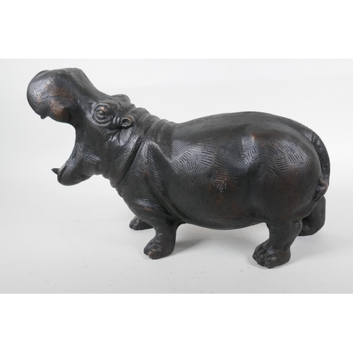 102 - A bronzed metal figure of a hippopotamus, 14