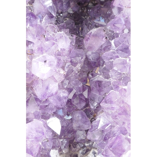 106 - An amethyst geode, 13½