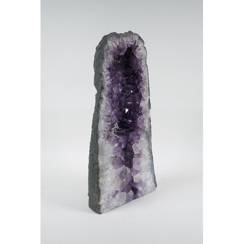 106 - An amethyst geode, 13½