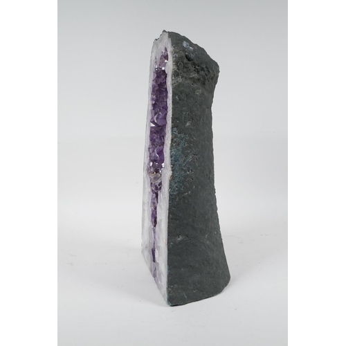 106 - An amethyst geode, 13½