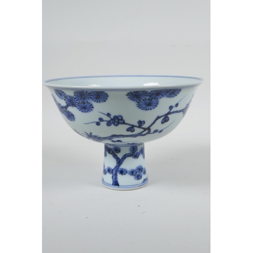 108 - A Chinese blue and white porcelain stem bowl with cypress tree, prunus blossom and bamboo decoration... 