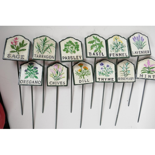 116 - A set of twelve painted cast iron herb garden plant markers, 2¾