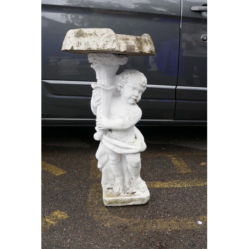 1197 - A painted concrete adapted birdbath in the form of a cherub holding a cornucopia with a clam shell b... 