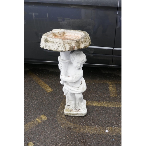 1197 - A painted concrete adapted birdbath in the form of a cherub holding a cornucopia with a clam shell b... 