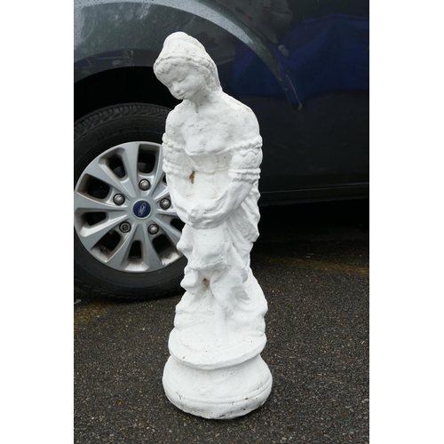 1202 - A painted concrete garden statue of a farm worker, 31½