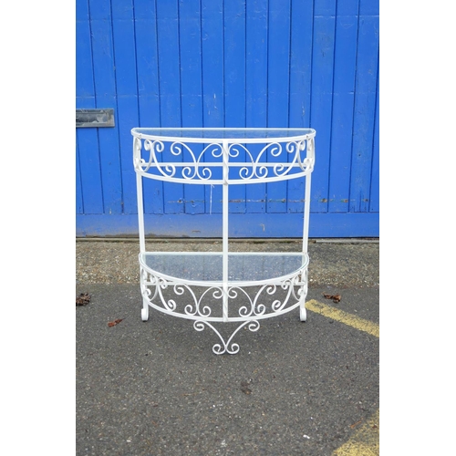 1208 - A painted metal demi-lune two tier garden table, 26