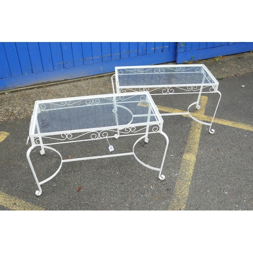 1209 - A pair of painted metal coffee tables, with glass tops, 36