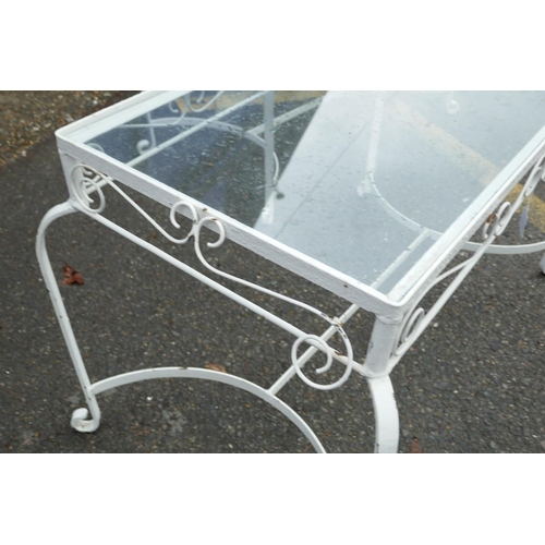 1209 - A pair of painted metal coffee tables, with glass tops, 36