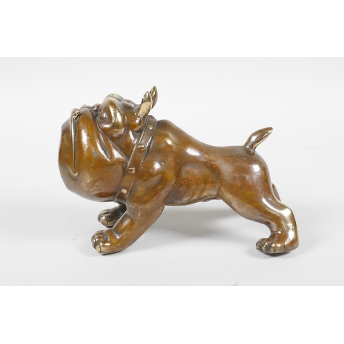 33 - A filled bronze figure in the form of a comical bulldog, 5½