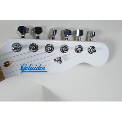 4 - An electric guitar in the style of a Fender with blonde maple veneered body, the head bears label Ge... 