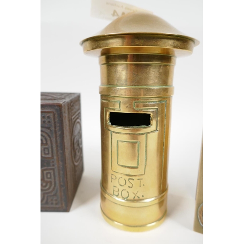 44 - A Chinese engraved brass table cigarette box, the cover set with good luck symbols, 4¼