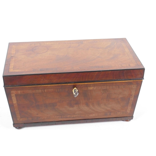 49 - An early Regency (c.1820) Cuban mahogany two compartment tea caddy, the case crossbanded with satinw... 