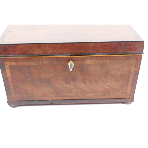 49 - An early Regency (c.1820) Cuban mahogany two compartment tea caddy, the case crossbanded with satinw... 