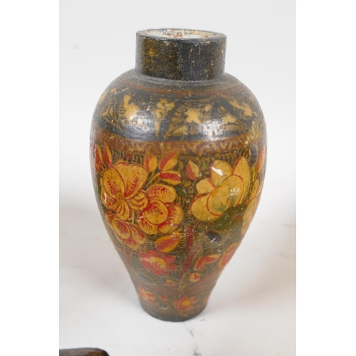 59 - A vintage Kashmiri papier mache bulbous vase decorated with flowers, 3½