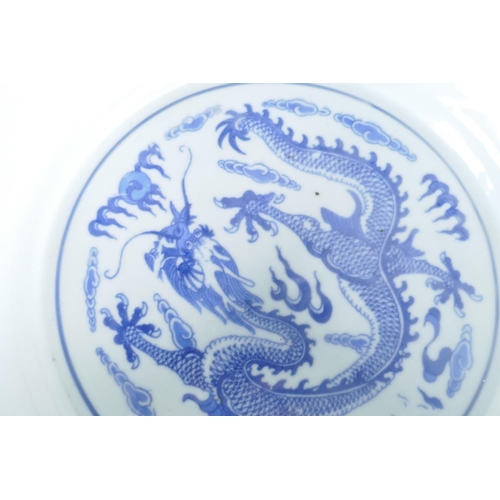 6 - A Chinese blue and white porcelain bowl painted with herons amongst the reeds, 10