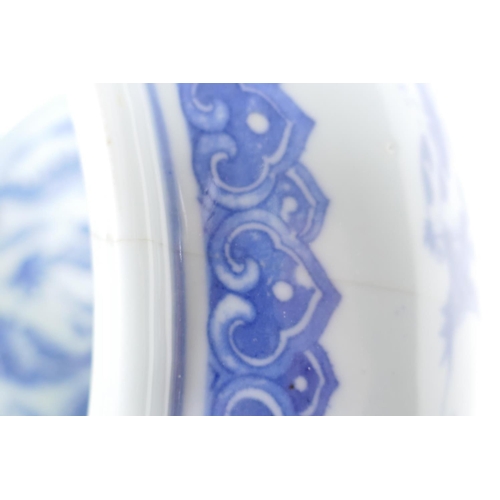 6 - A Chinese blue and white porcelain bowl painted with herons amongst the reeds, 10