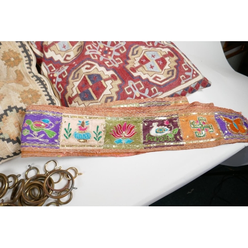 64 - A Vintage Uzbekistan suzani embroidered door drape, an Indian pelmet, two Uzbekistan suzani embroide... 