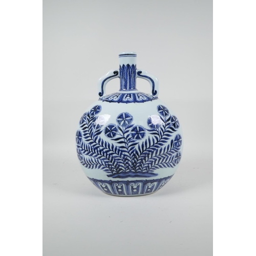 68 - A Chinese Ming style blue and white porcelain two handled moon flask with floral decoration, 6 chara... 