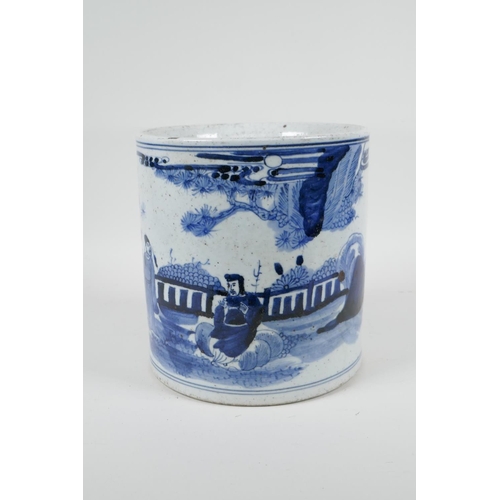 70 - A Chinese Republic period blue and white porcelain brush pot decorated with figures in a landscape, ... 