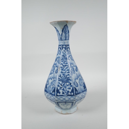 73 - A Chinese Yuan style blue and white pottery pear shaped vase of octagonal form with floral decoratio... 