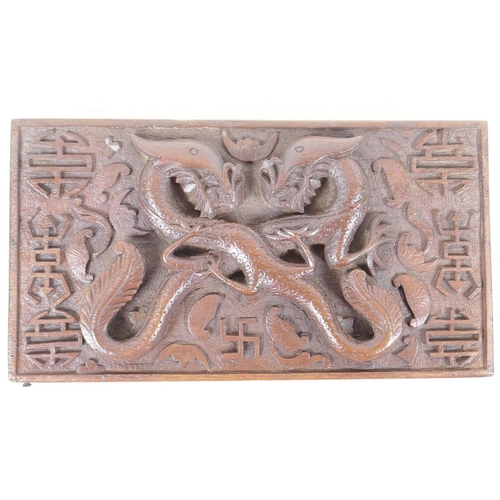 76 - An antique carved wood artist's box, the lid heavily carved with dragons and symbols inside and out,... 