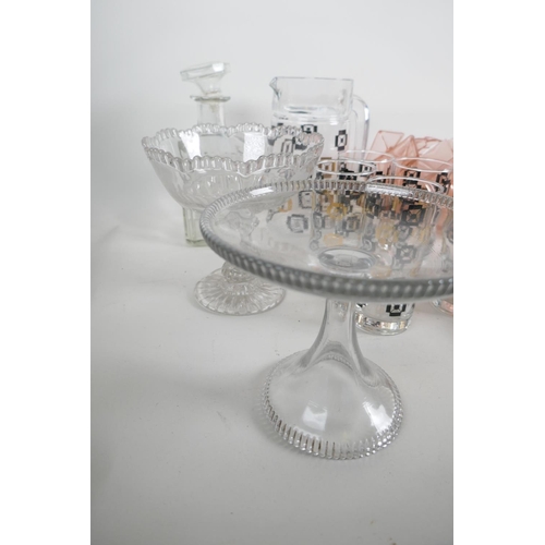 77 - An Art Deco pink glass fruit service of serving bowl and six pedestal bowls together with a vintage ... 