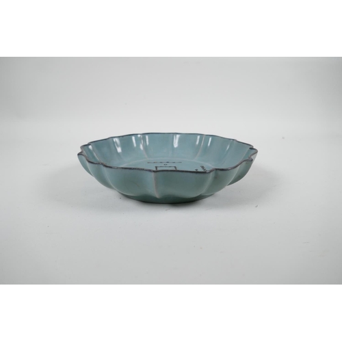 80 - A Chinese Ru ware style celadon glazed dish of lobed form, with chased decoration to the bowl, 7&fra... 