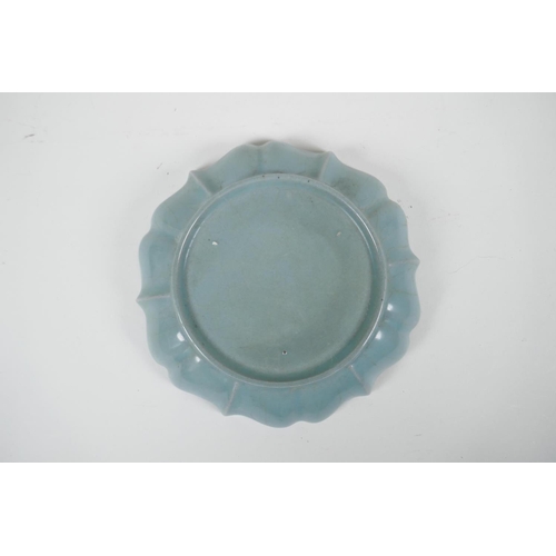 80 - A Chinese Ru ware style celadon glazed dish of lobed form, with chased decoration to the bowl, 7&fra... 