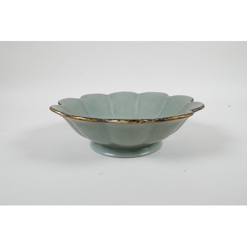 88 - A Chinese Song style celadon crackle glazed bowl of petal form, with a gilt rim, the bowl with chase... 