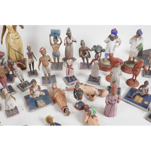 89 - A collection of 41 vintage Indian painted wood and terracotta figures