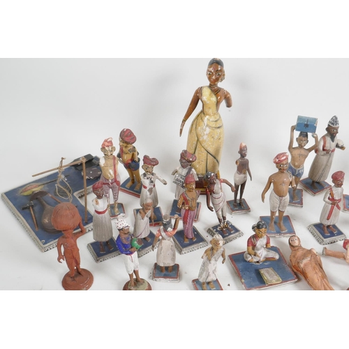 89 - A collection of 41 vintage Indian painted wood and terracotta figures