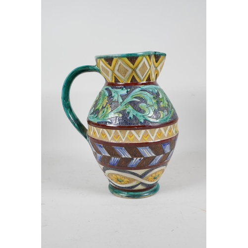 92 - A majolica water jug with scrolling leaf and sunflower decoration, 10