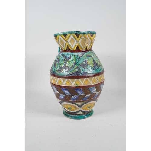 92 - A majolica water jug with scrolling leaf and sunflower decoration, 10