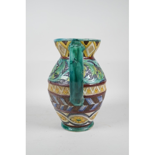 92 - A majolica water jug with scrolling leaf and sunflower decoration, 10