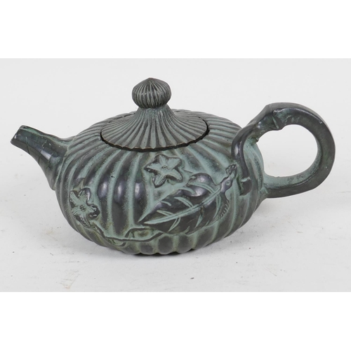 94 - A Chinese bronze teapot in the form of a gourd, 4 character mark to base, 5