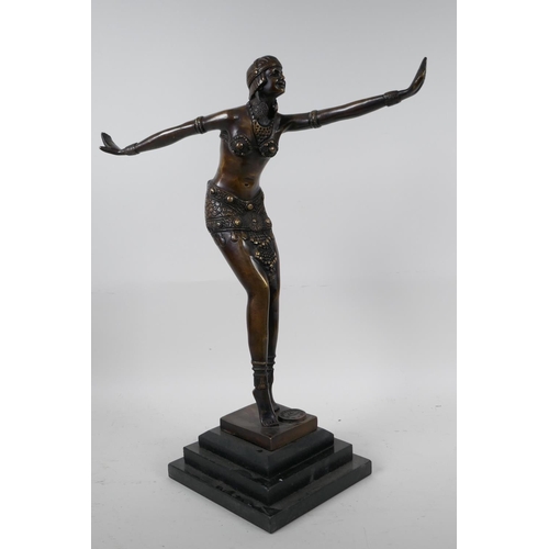 96 - An Art Deco style bronze figure of a dancing girl in the manner of Preiss on a stepped plinth, 15