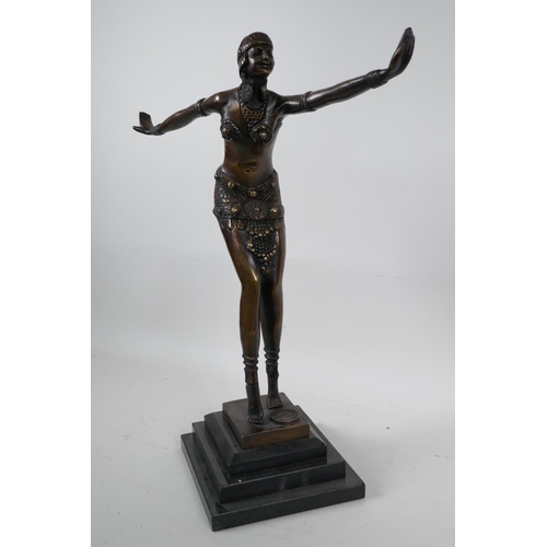 96 - An Art Deco style bronze figure of a dancing girl in the manner of Preiss on a stepped plinth, 15