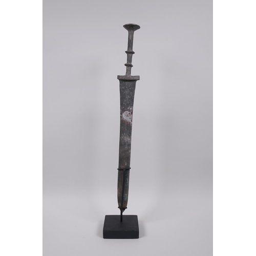 18 - A Chinese archaic style bronze dagger/short sword on a display mount, 15