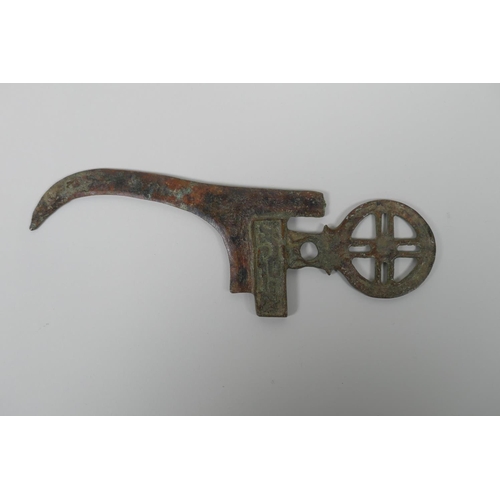 53 - A Chinese patinated bronze archaic style ge head (dagger axe head), 10½