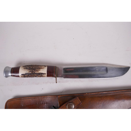 12 - A Bowie knife by J. Nowill & Sons, Sheffield, with 8