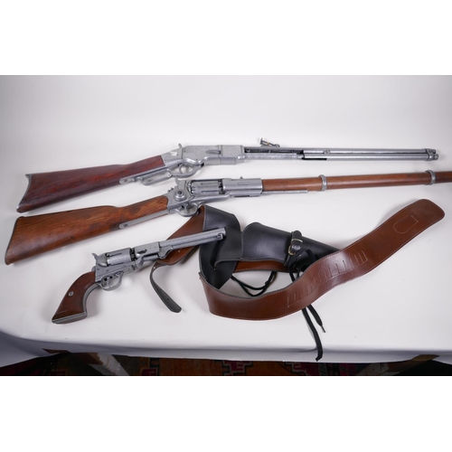 26 - Two replica American western rifles and a replica Colt revolver in holster and belt