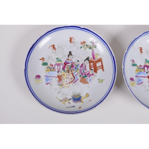 48 - A pair of  C19th Chinese famille rose enamelled porcelain dishes, decorated with women and children,... 