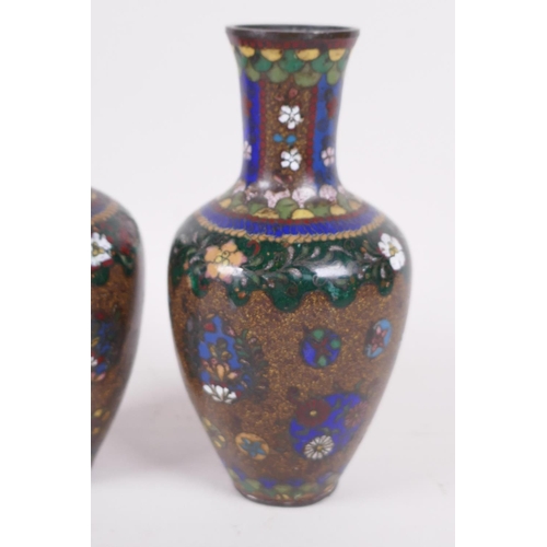 49 - A pair of Oriental wireless cloisonne narrow necked vases, 6