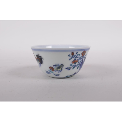 50 - A doucai porcelain tea bowl with chicken decoration, Qianlong seal mark to base, 3