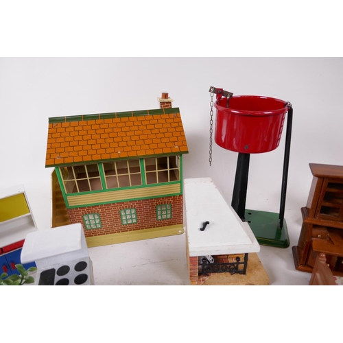 7 - Three Hornby railway items, signal box, water tank and crane, together with a quantity of dolls hous... 