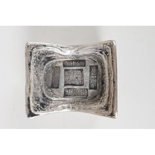 210 - A Chinese white metal ingot, impressed character marks to top, 3&frac12;